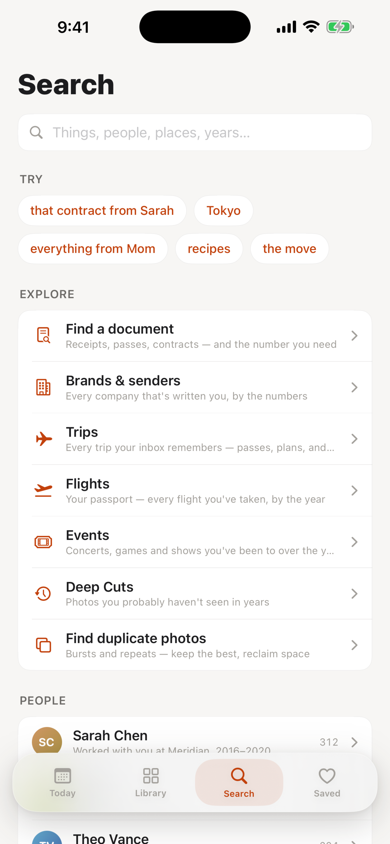 Natural-language search across people, places, years and the text inside documents.